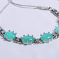 Elegant Sea Green Stone Necklace Set with Silver Finish