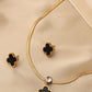 Elegant Black Clover Pendant Necklace with Gold Accents