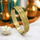 Radiant Gold-Tone Designer Bracelet – Elegant Geometric Finish