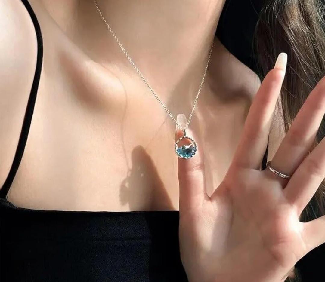 Ocean Wave & Dolphin Pendant Necklace – Serenity in Silver