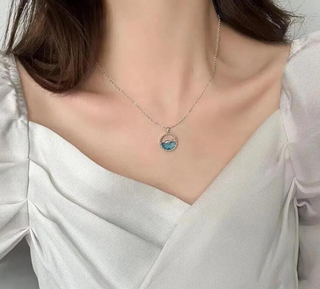 Ocean Wave & Dolphin Pendant Necklace – Serenity in Silver