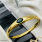 Emerald Glow Gold-Plated Bangle